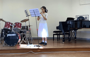 Girl playing the recorder