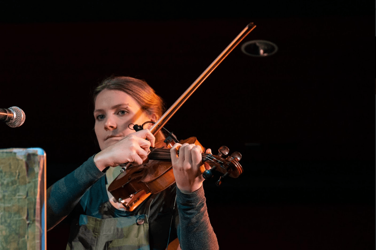 Anna Hughes playing a violin