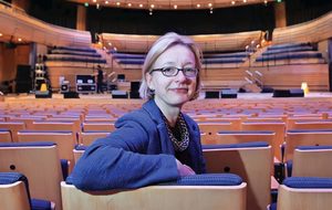 Abigail in a blue jacket in Sage-One