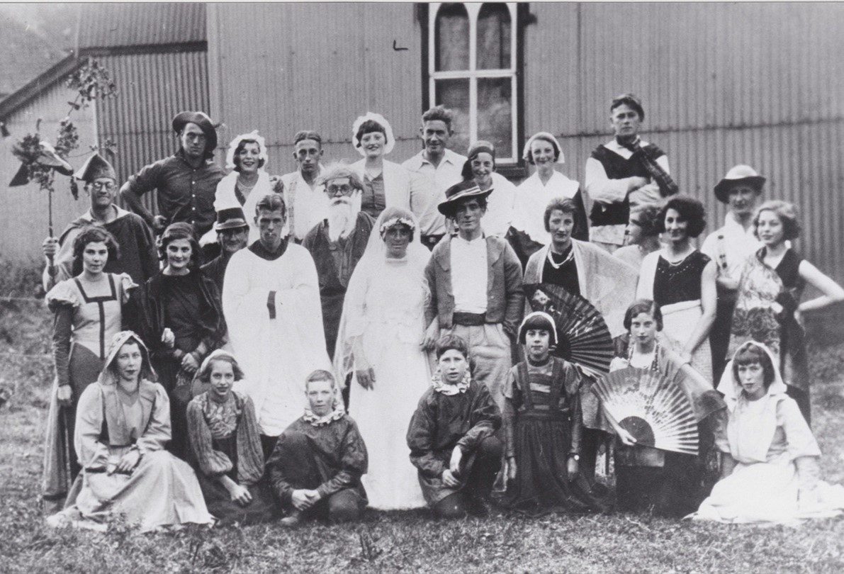 Michael Tippetts production of Robin Hood with miners in costume.