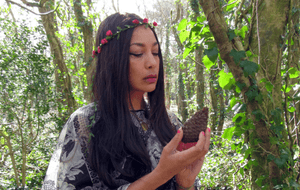 Angeline Morrison wearing a flower crown