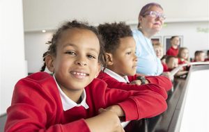 Children look down on to the Concourse at The Glasshouse from the upper balcony.