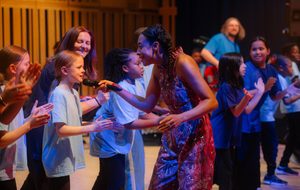 Corinne Bailey Rae performing with young people.