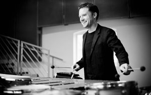 Colin Currie playing percussion instruments.